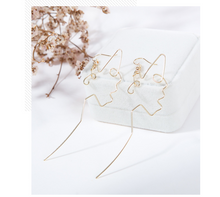 Japan and South Korea minimalist simple metal gold silhouette face long ear hook earrings female pierced ear clip earrings
